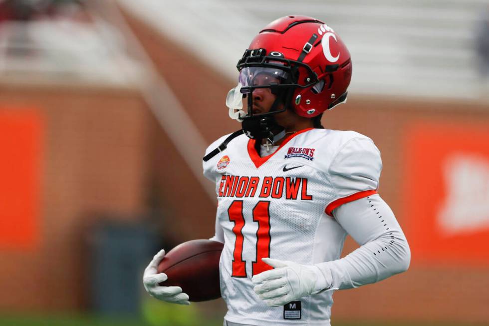 National wide receiver Tre Tucker of Cincinnati (11) runs drills during practice for the Senior ...