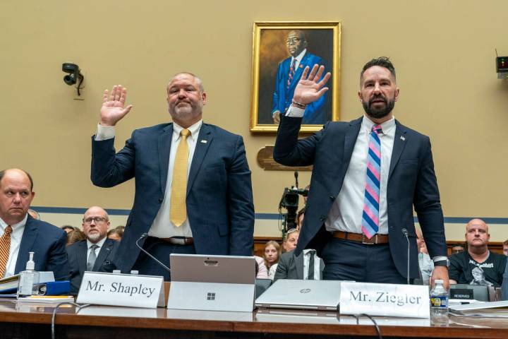 IRS Supervisory Special Agent Gary Shapley, left, and IRS Criminal Investigator Joseph Ziegler ...