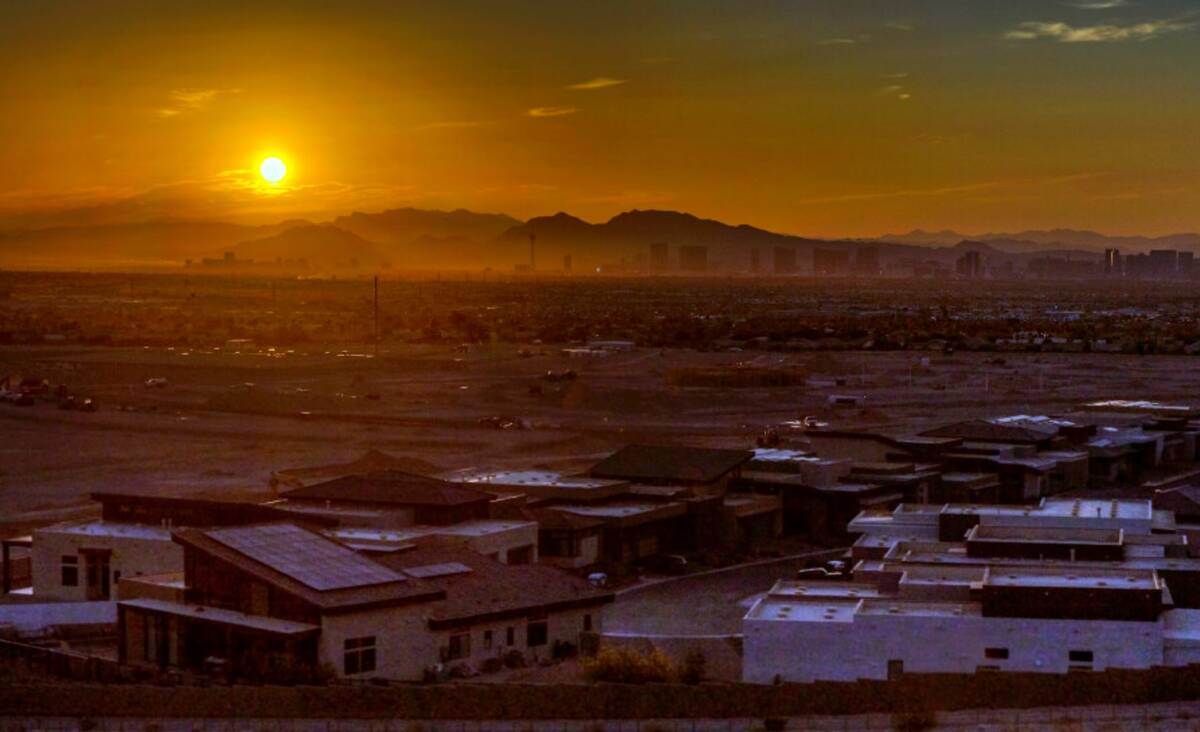 The sun rises over the valley and Strip on Thursday, July 20, 2023, in Las Vegas (L.E. Baskow/L ...