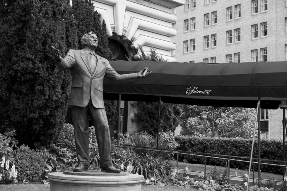 FILE - A statue of singer Tony Bennett stands outside the closed Fairmont Hotel in San Francisc ...