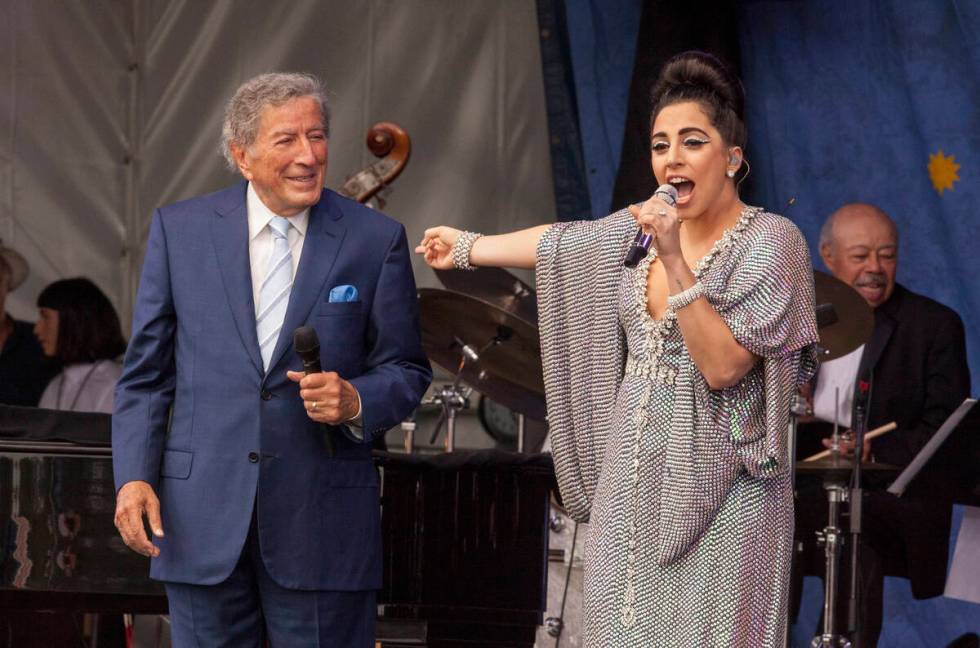 FILE - Tony Bennett, left, and Lady Gaga perform at the New Orleans Jazz & Heritage Festiva ...