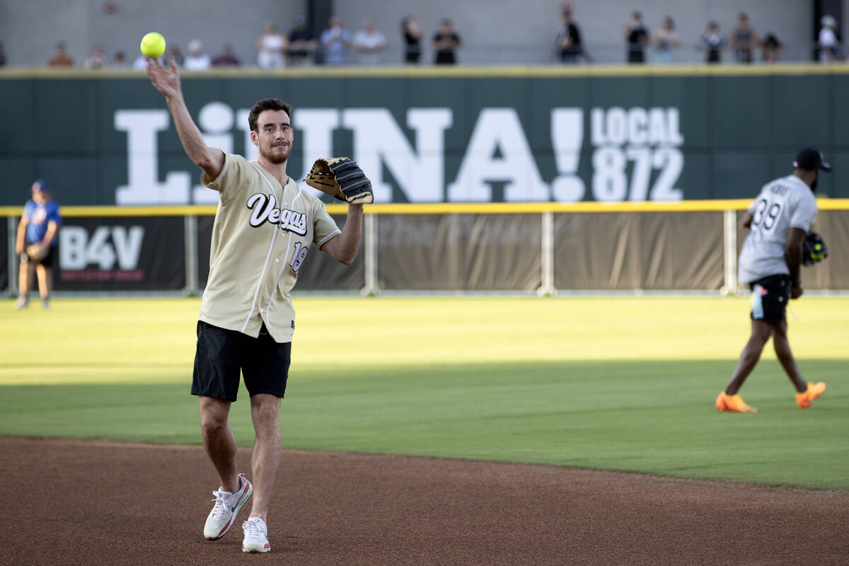 Golden Knights’ Reilly Smith plays catch before the Battle for Vegas charity softball ga ...