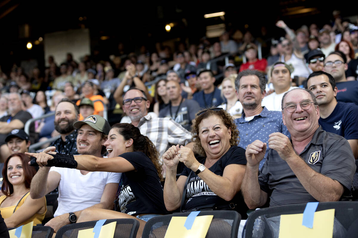Fans watch the home run derby before the annual Battle for Vegas charity softball game between ...