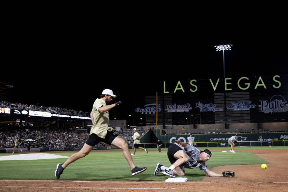 Raiders defensive end Maxx Crosby misses the out while Golden Knights defenseman Nicolas Hague ...