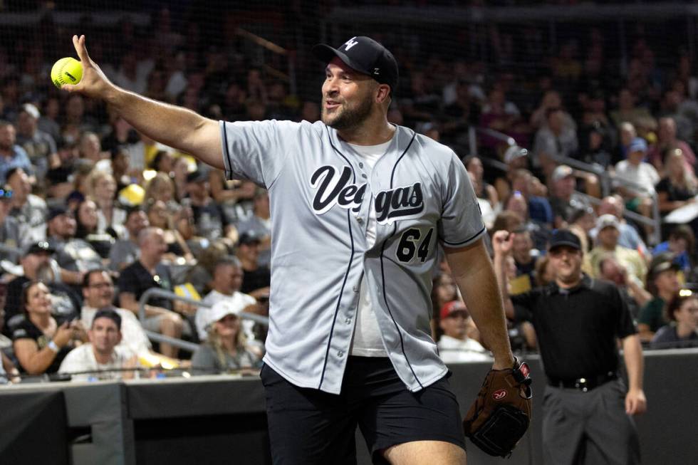 Raiders player Alex Bars gestures after catching his second foul ball for an out during the ann ...