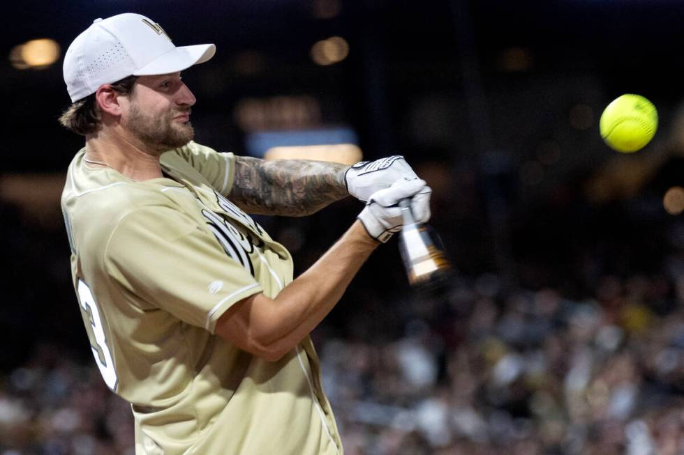 Golden Knights goaltender Adin Hill bats against the Raiders during the annual Battle for Vegas ...