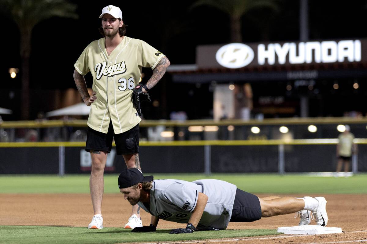 Golden Knights goaltender Logan Thompson is confused as Raiders punter A.J. Cole III does pushu ...