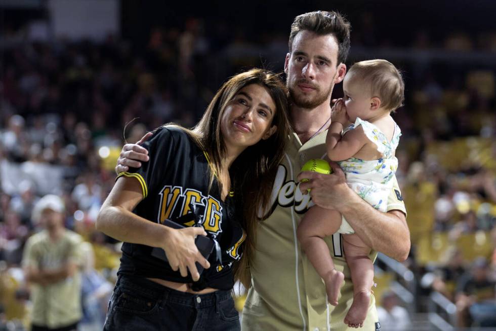 Melissa Smith, Reilly Smith and daughter Isla Smith take in a tribute for former the Golden Kni ...