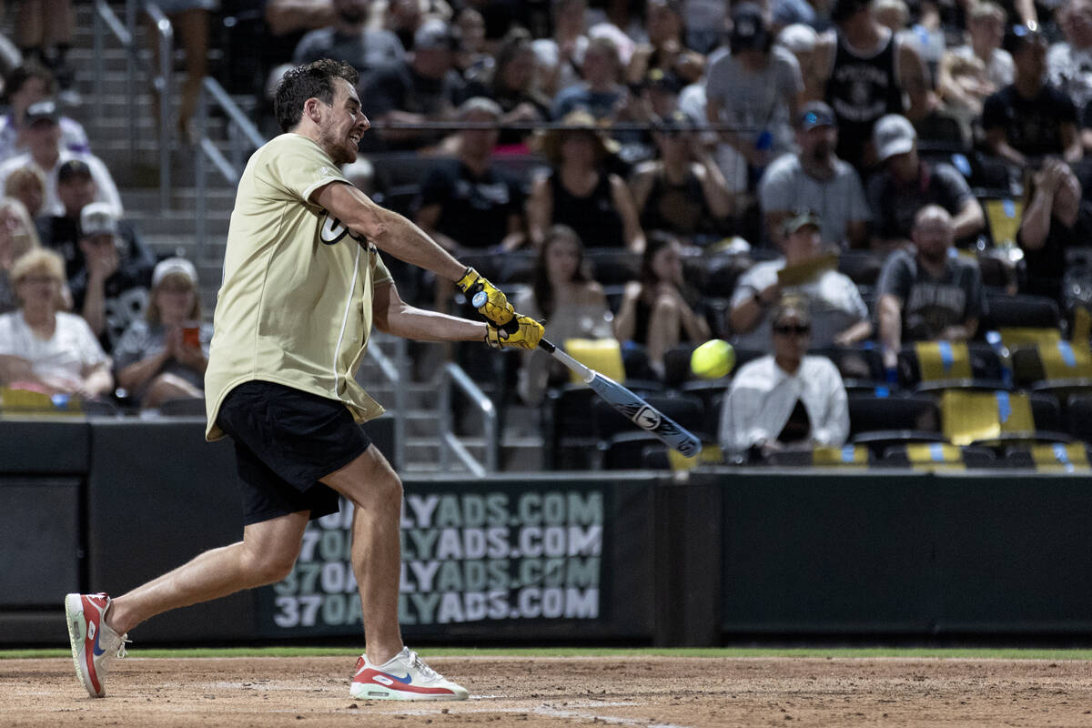 Former Golden Knight and event organizer Reilly Smith hits a home run during the annual Battle ...