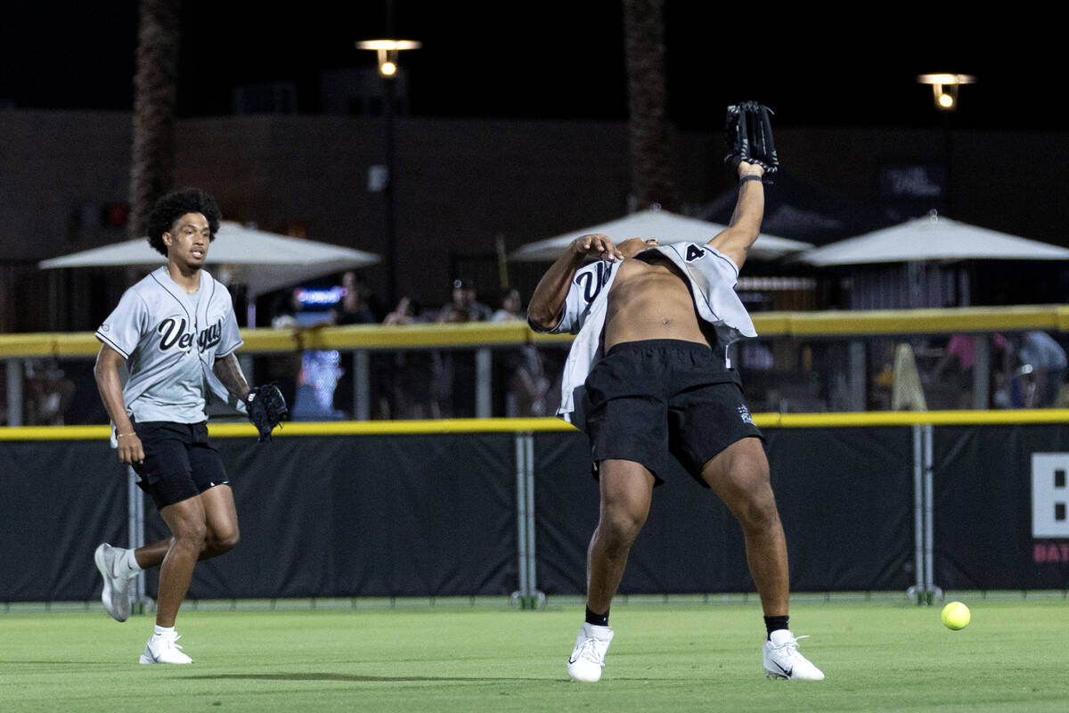 Raiders fullback Jakob Johnson bends back but misses a catch during the annual Battle for Vegas ...