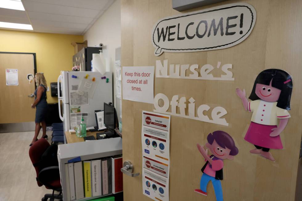 Clark County School District Chief Nurse Sheri McPartlin talks to a reporter during a news medi ...