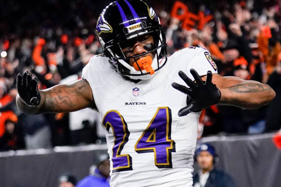 Baltimore Ravens cornerback Marcus Peters (24) reacts after breaking up a pass during a wild-ca ...