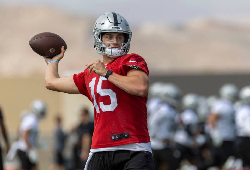 Raiders quarterback Chase Garbers (15) prepares to throw during practice at the Intermountain H ...