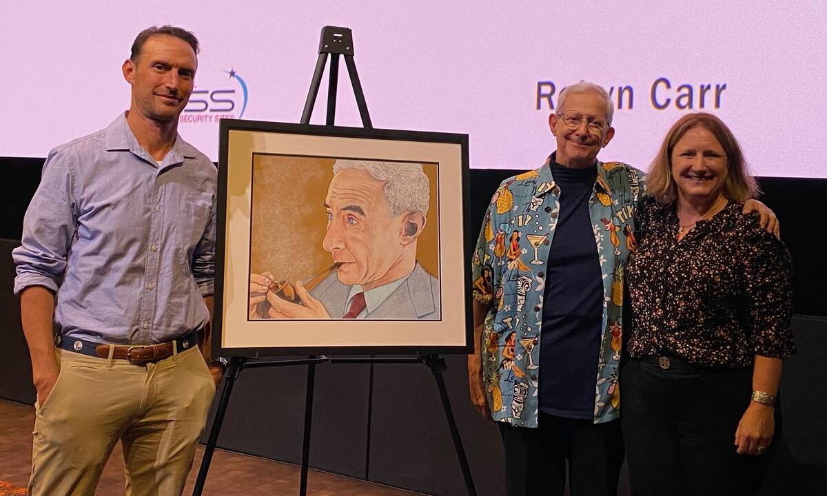 Artist Martin Kreloff presents his portrait of J. Robert Oppenheimer to grandchildren Charles O ...