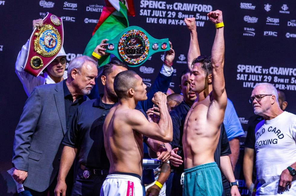 Boxers Isaac Cruz faces off with Giovanni Cabrera following their weigh-ins ahead of their figh ...