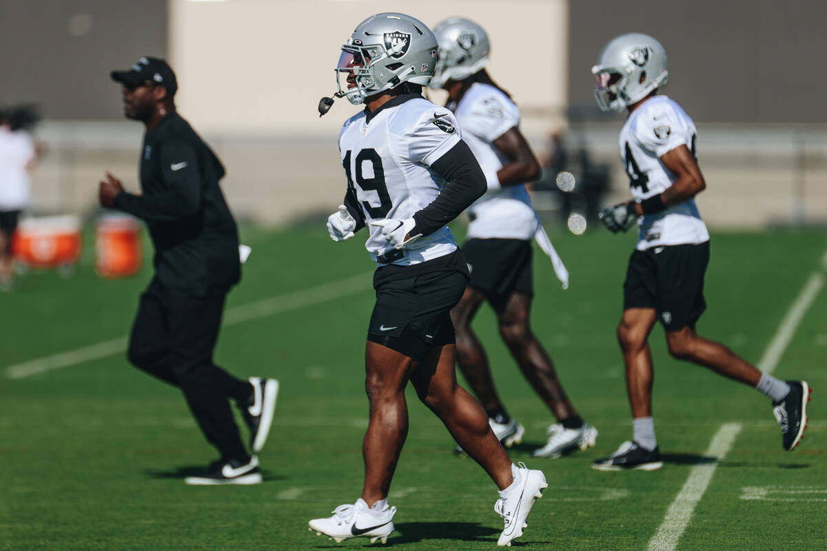 Raiders wide receiver DJ Turner runs down the practice field during training camp at the Interm ...