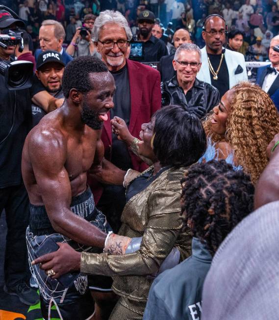 Terence Crawford celebrates his win with his family over Errol Spence Jr., ended in round 9 dur ...