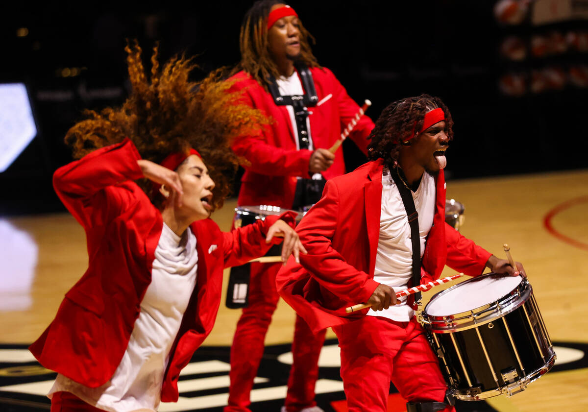 The Pack Drumline, an America’s Got Talent winner, performs during a WNBA basketball gam ...