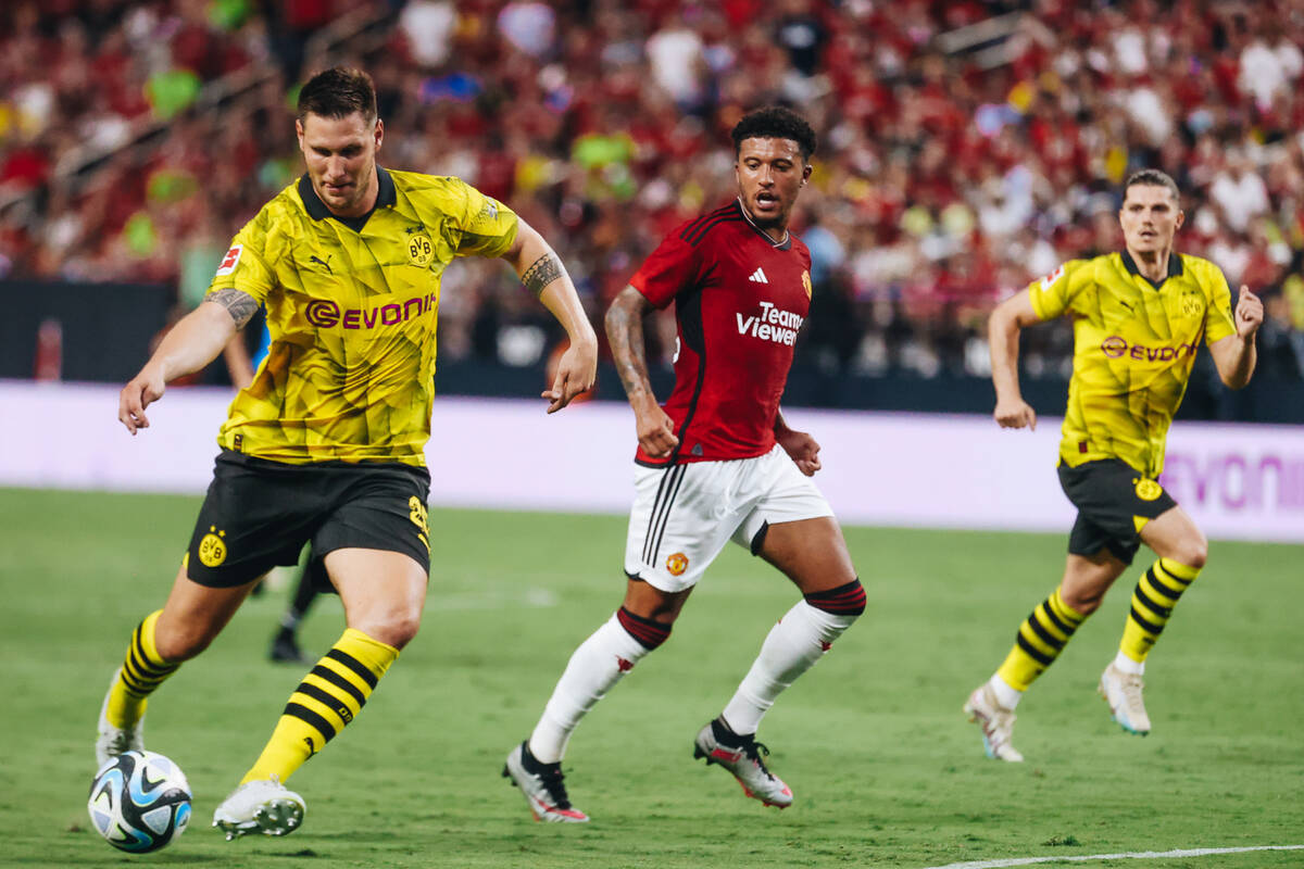 Borussia Dortmund defender Niklas Sule (25) kicks the ball during a match up against Manchester ...