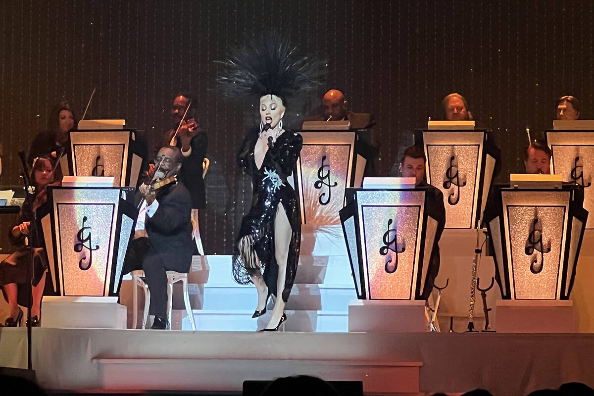 Lady Gaga is shown with sax player Steve Kortyka at Dolby Live at Park MGM on Sunday, May 1, 20 ...