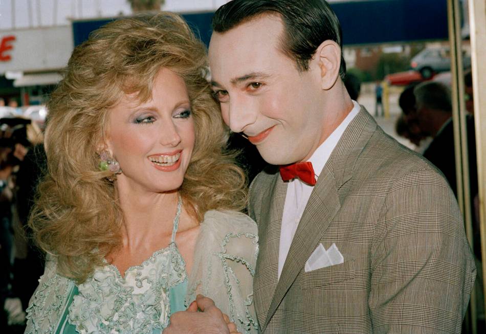 Actress Morgan Fairchild and funny man Pee-Wee Herman (Paul Reubens) pose for photographers as ...