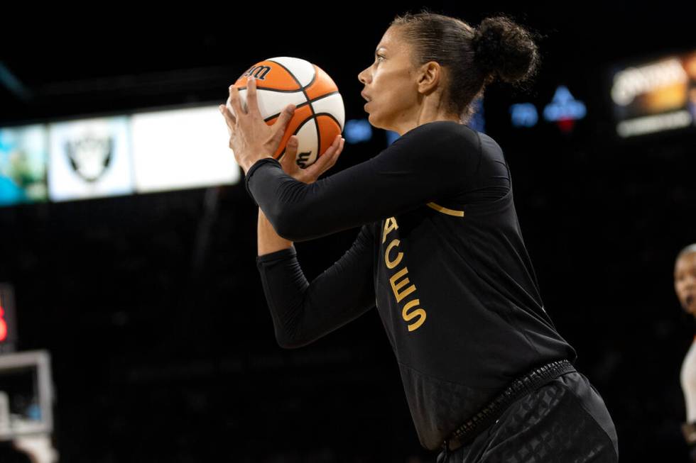 Las Vegas Aces forward Alysha Clark (7) prepares to shoot a three-pointer during the second hal ...