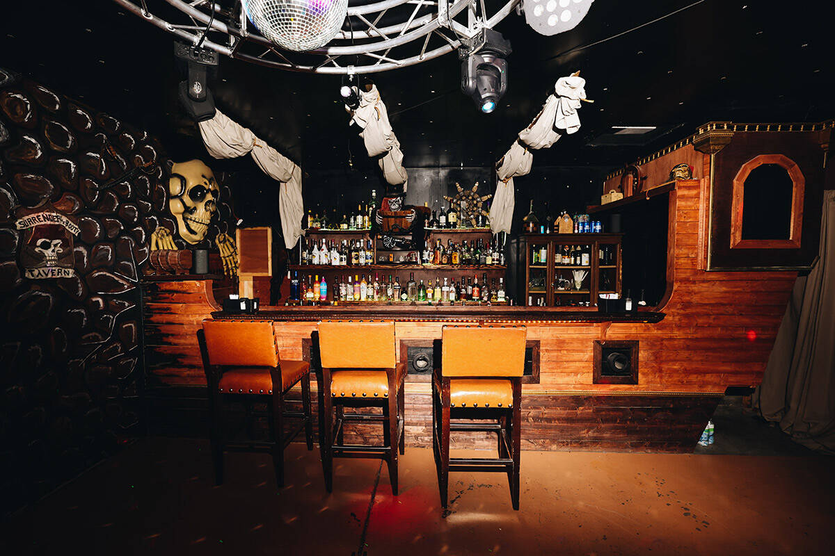 A bar shaped like a pirate ship is seen inside of a pirate-themed house on Wednesday, July 26, ...