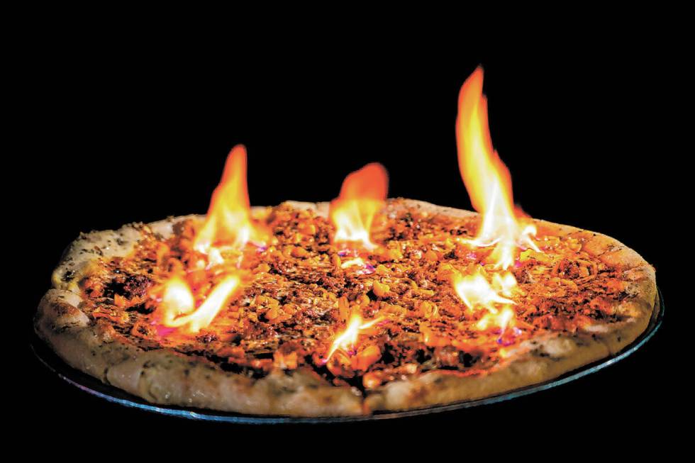  Evel Pie You must sign a medical waiver to order The Reaper, an incendiary pizza at Evel ...