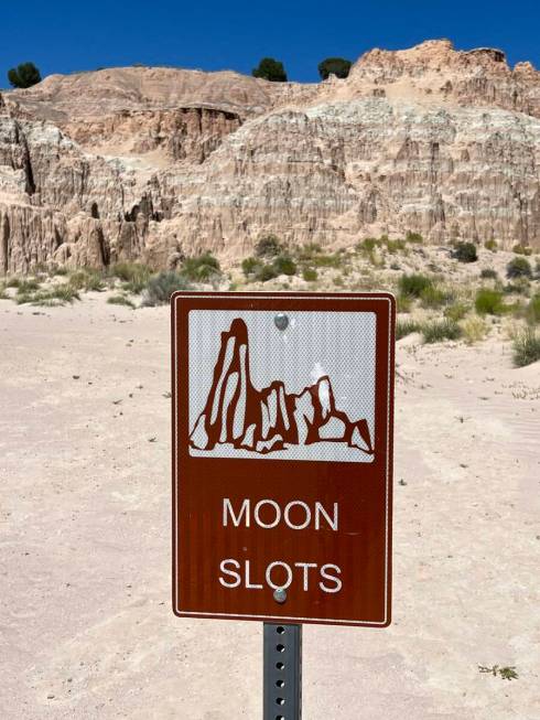 A sign marks the Moon Caves slot canyons on July 8, 2023, in Cathedral Gorge State Park. (Carri ...