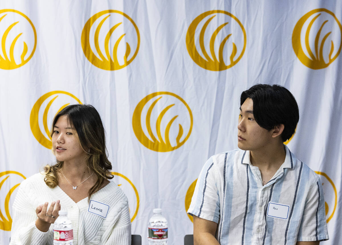 Leona Chan, left, Bishop Gorman School student, speaks as Alexander Choi, West Career and Techn ...