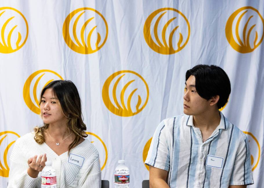 Leona Chan, left, Bishop Gorman School student, speaks as Alexander Choi, West Career and Techn ...