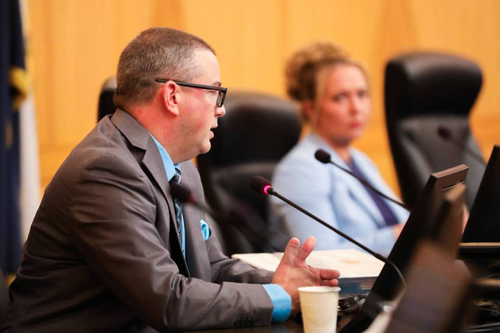 Metropolitan Police Department Detective Blake Penny addresses ombudsman, Michael Troiano, at a ...