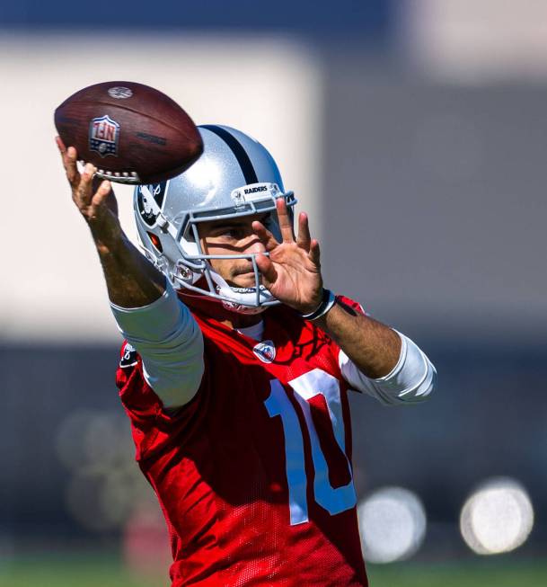 Raiders quarterback Jimmy Garoppolo (10) releases a pass during training camp at the Intermount ...