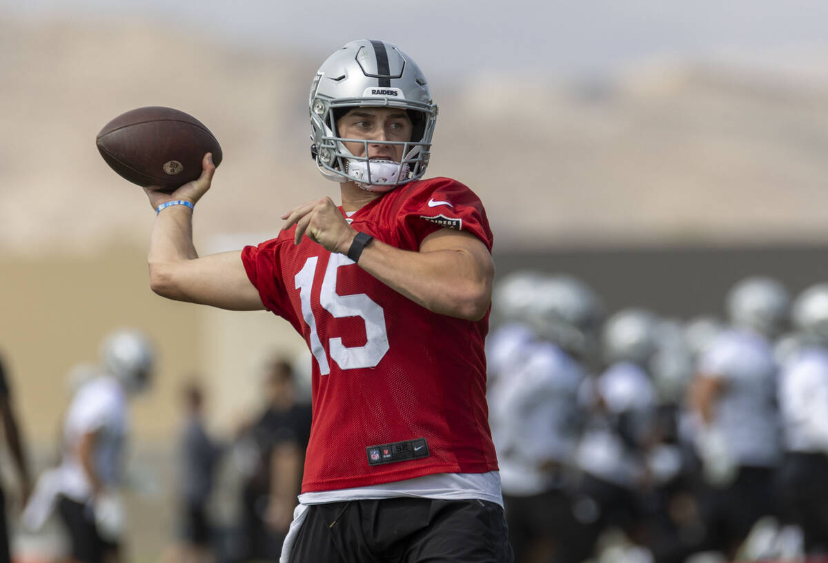 Raiders quarterback Chase Garbers (15) prepares to throw during practice at the Intermountain H ...