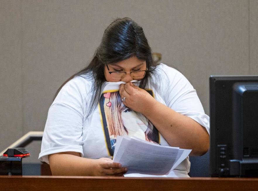 Kassandra Carbajal Kumar, a sister of murder victim Natelie Carbajal, pauses as she delivers h ...