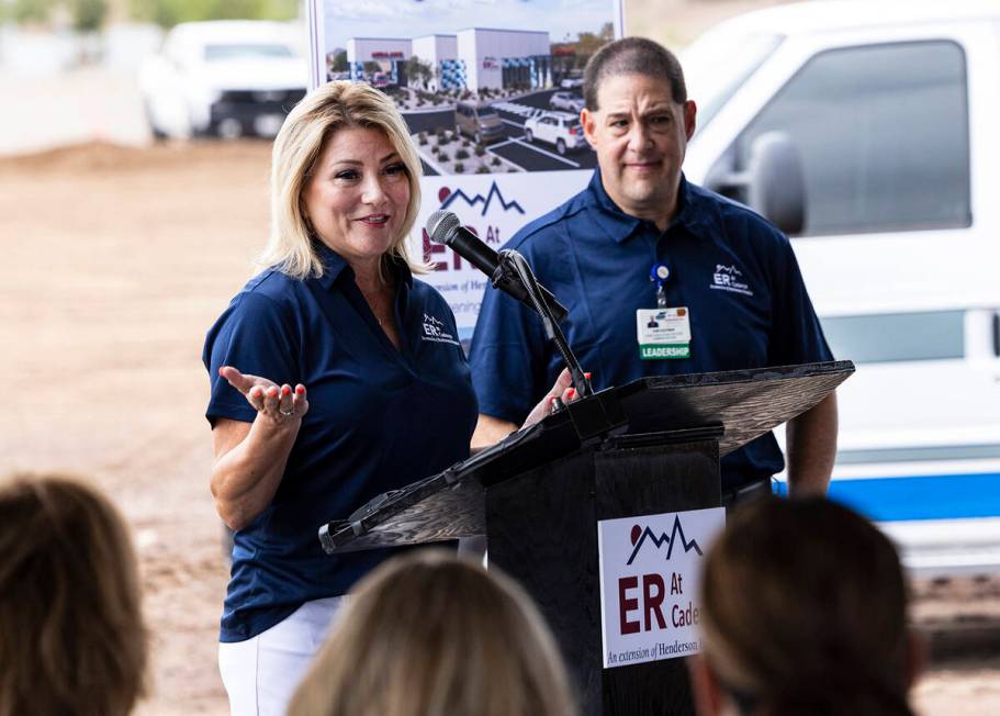 City of Henderson Mayor Michelle Romero speaks as Sam Kaufman, CEO of Henderson Hospital, looks ...