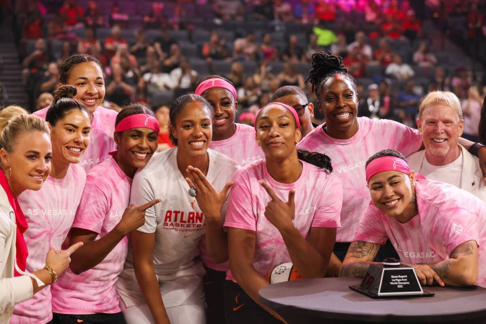 The Las Vegas Aces celebrate their former teammate, Atlanta Dream center Iliana Rupert (21), as ...