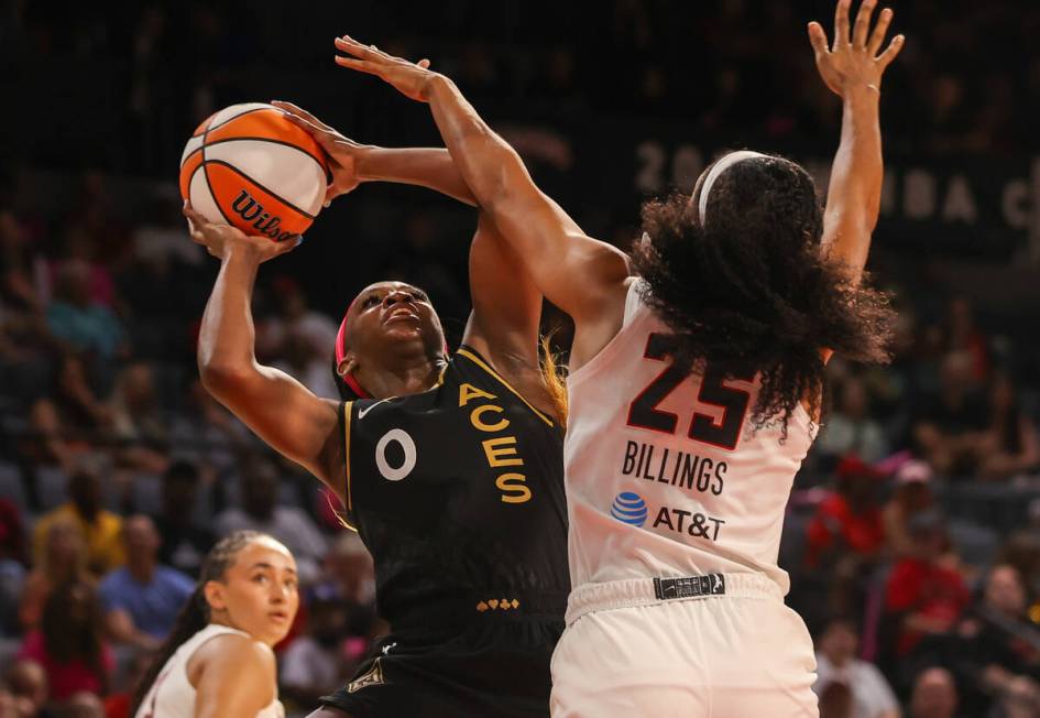 Las Vegas Aces guard Jackie Young (0) takes a shot during a WNBA basketball game against the At ...