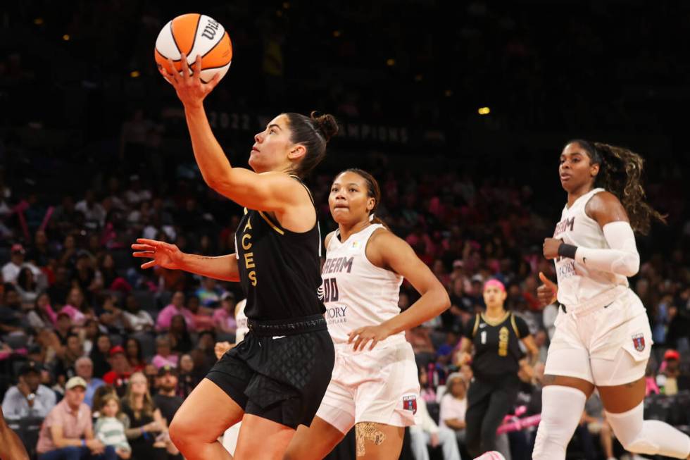 Las Vegas Aces guard Kelsey Plum (10) shoots a layup during a WNBA basketball game against the ...