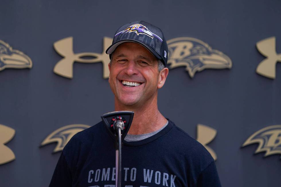 Baltimore Ravens head coach John Harbaugh speaks to reporters during his team's NFL football tr ...