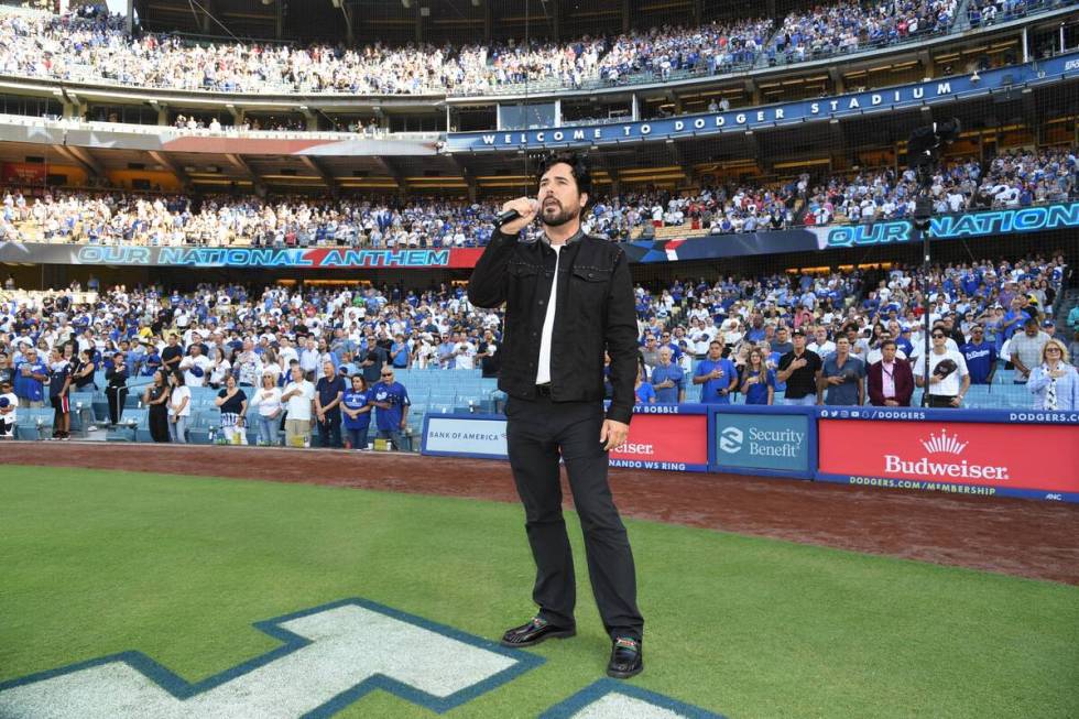 Vegas showman Frankie Moreno sings the national anthem at the L.A. Dodgers-Cincinnati Reds game ...