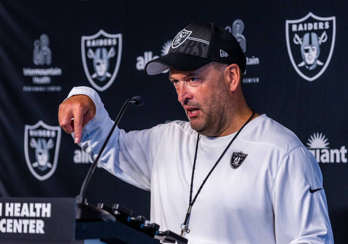 Raiders special teams coach Tom McMahon answers a question in a media interview during training ...