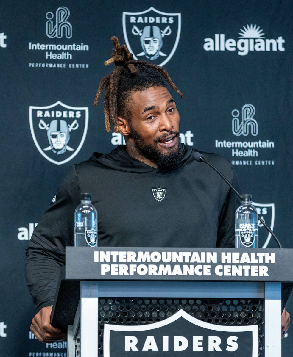 Raiders running back Brandon Bolden (34) answers a question during a press conference in traini ...