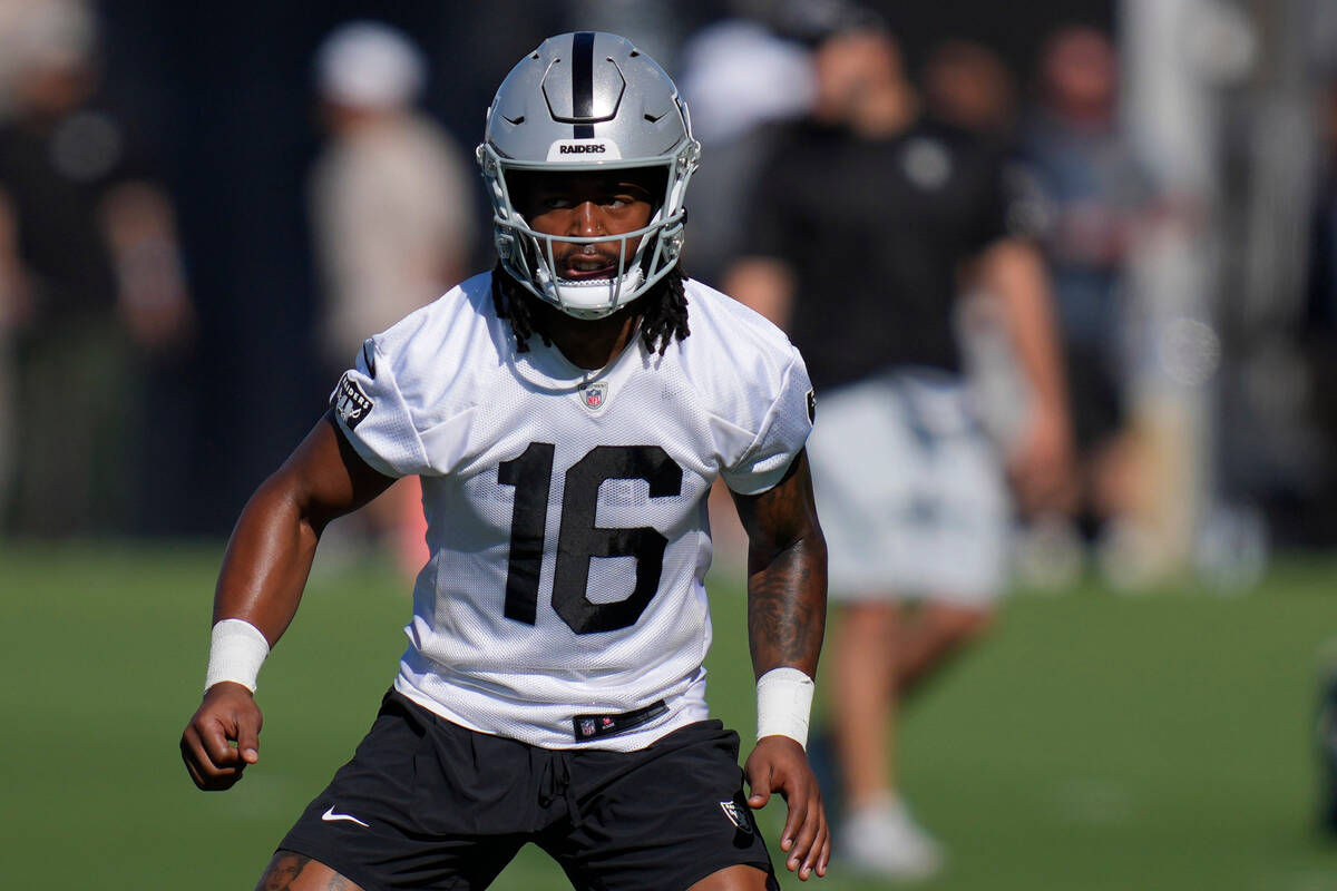 Las Vegas Raiders' Jakobi Meyers warms up during a practice at NFL football training camp Thurs ...