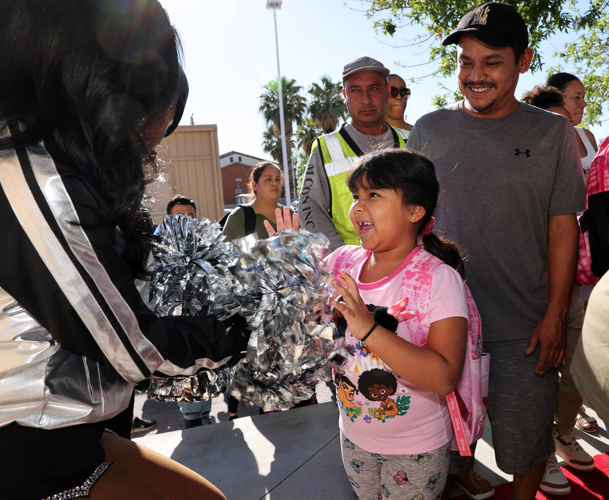 First grader Laura Ornelas Mendoza walks the red carpet during the annual “Welcome Back ...