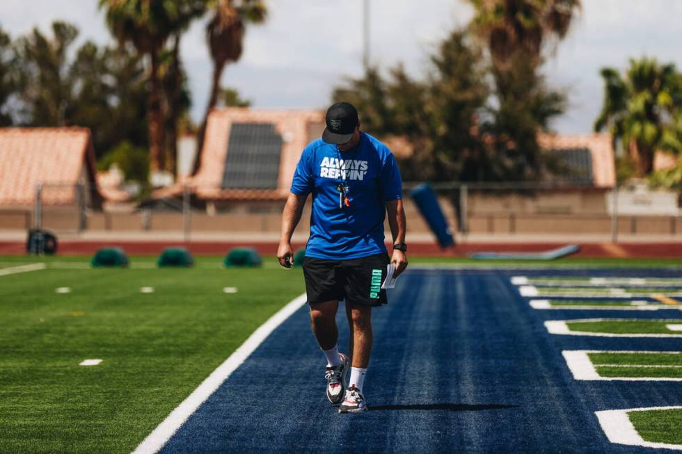 Green Valley head football coach Clay Mauro walks down the field during practice at Green Valle ...