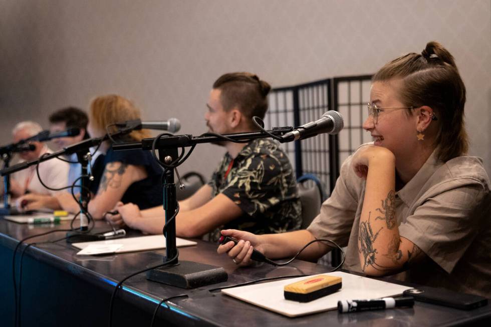 Contestant Mattea Roach answers a question during live trivia game Titan Throwdown 2 at Hampton ...