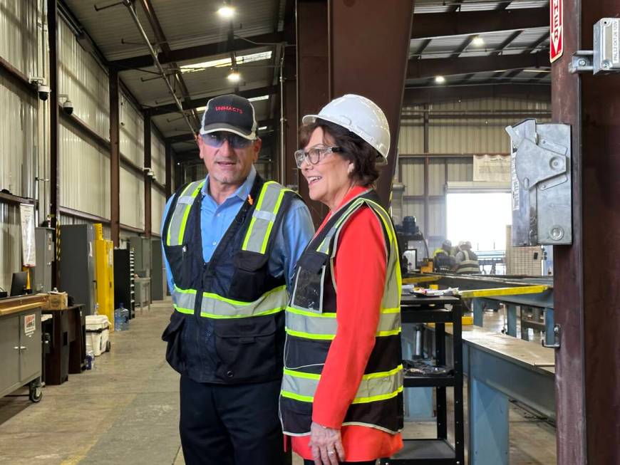 Sen. Jacky Rosen, D-Nev., right, listens to Nick Janevski, plant manager for Unimacts, at the c ...