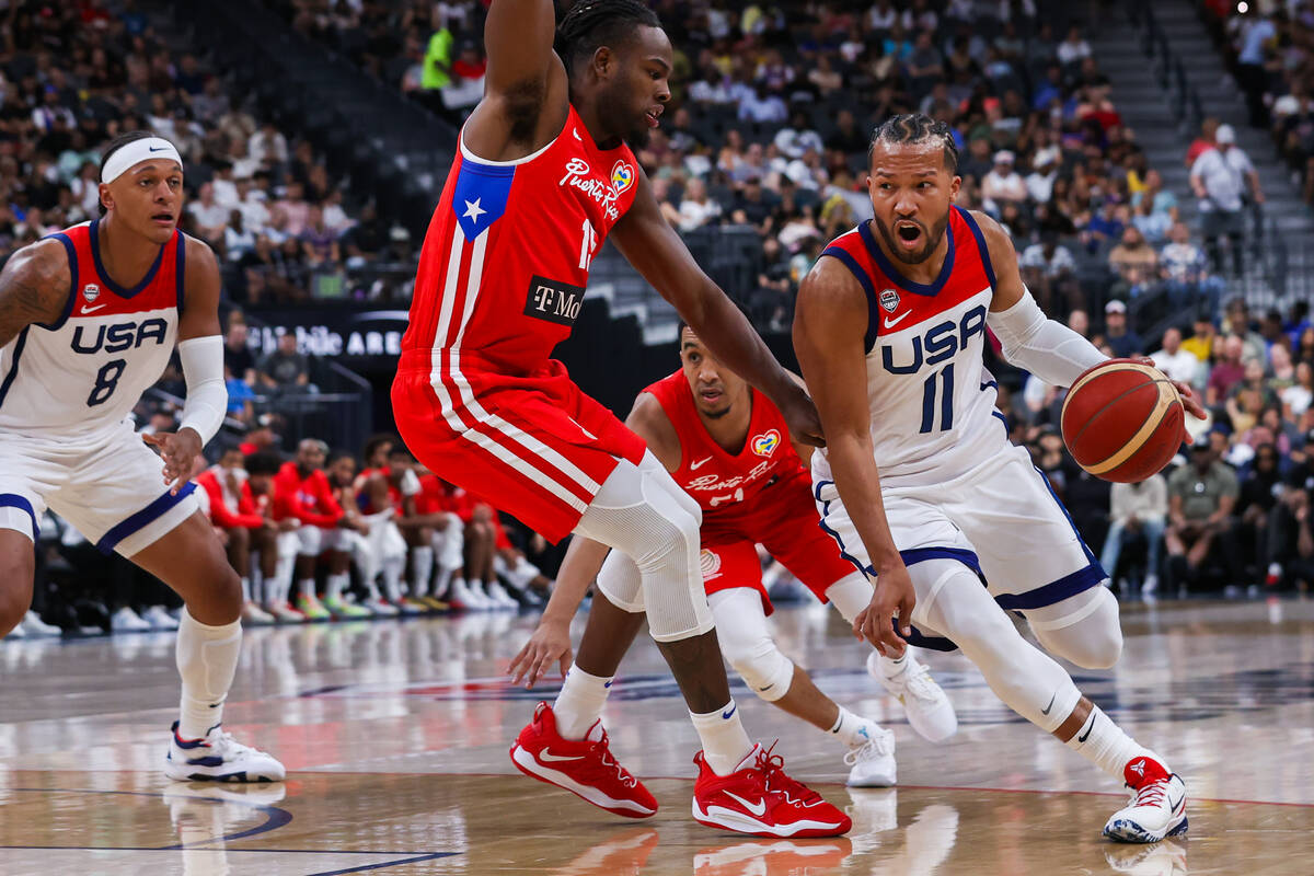 USA Basketball Men’s National Team guard Jalen Brunson (11) drives the ball past Puerto ...