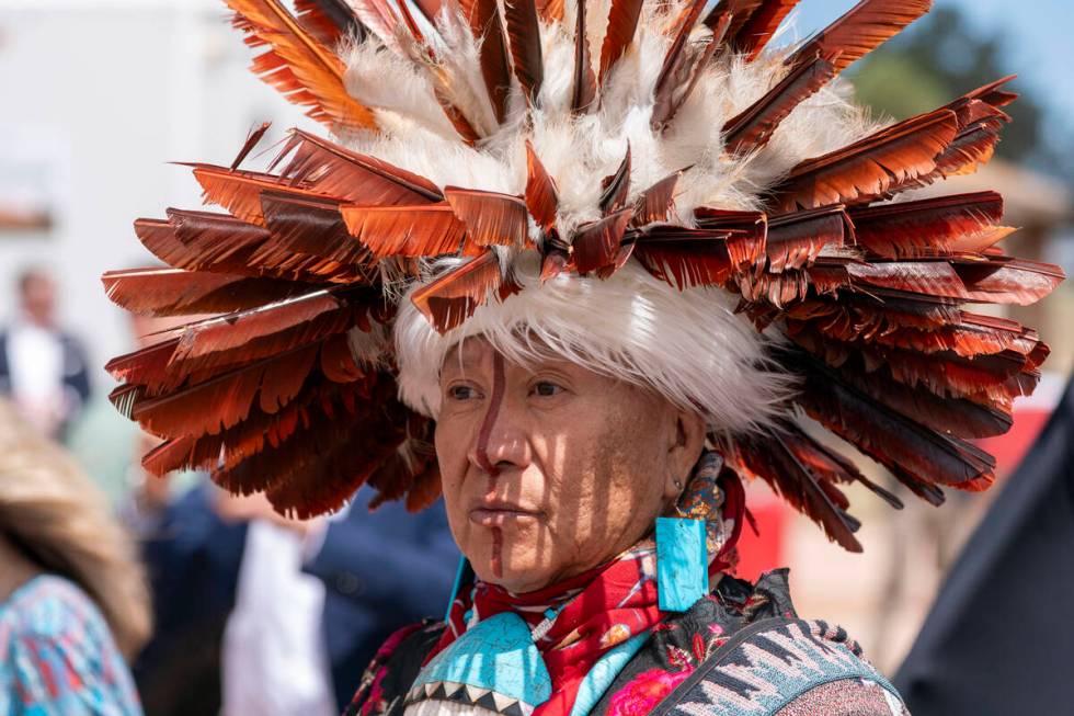 A supporter waits for President Joe Biden to speak and sign a proclamation designating the Baaj ...